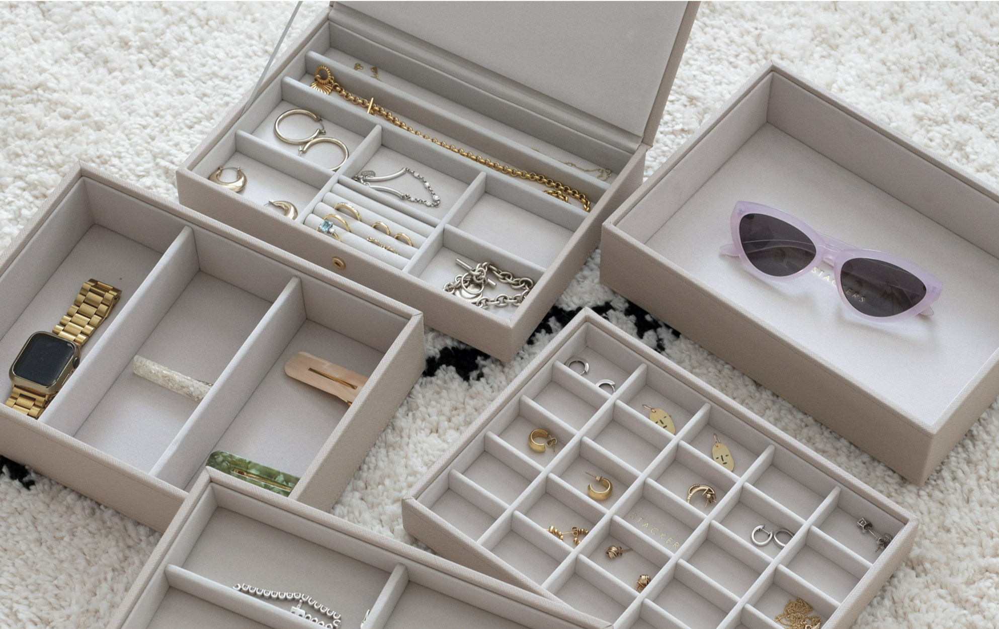 Assorted organisers in trays